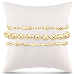 elevate the everyday gift stack - gold