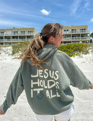 Jesus Holds It All Unisex Hoodie