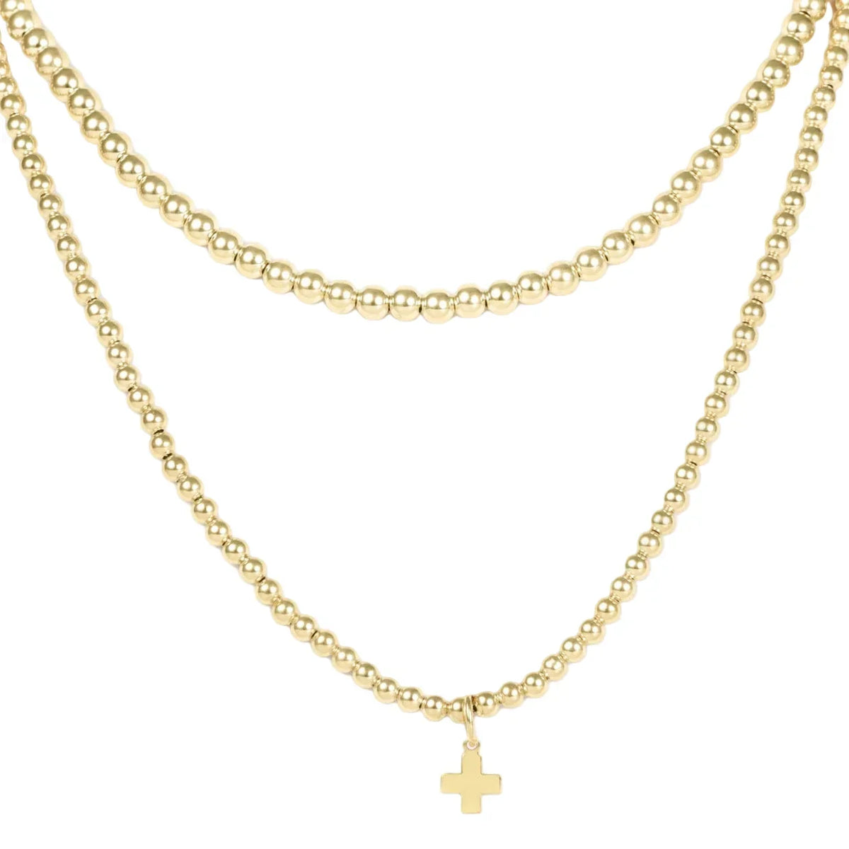 layers with meaning - gold signature cross charm
